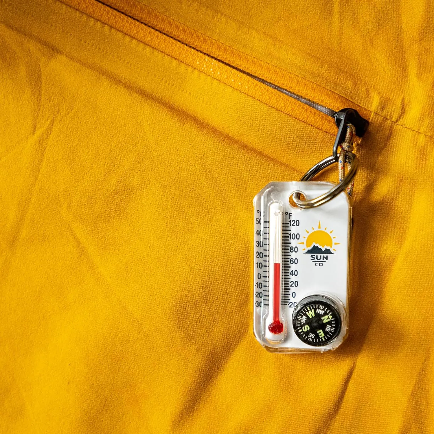 Sun Company Therm-o-Compass | Multi-Functional Zipper Pull Compass & Thermometer with Wind Chill Chart | Ideal for Camping, Hiking, and Outdoor Navigation